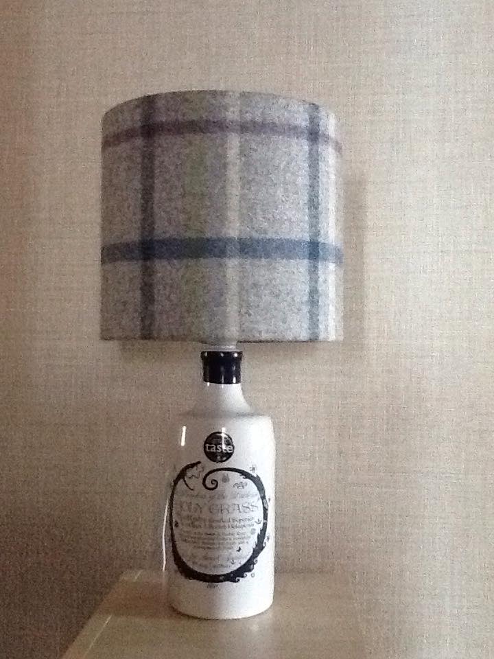 Lamp made from a bottle of Holy Grass Vodka with tartan shade