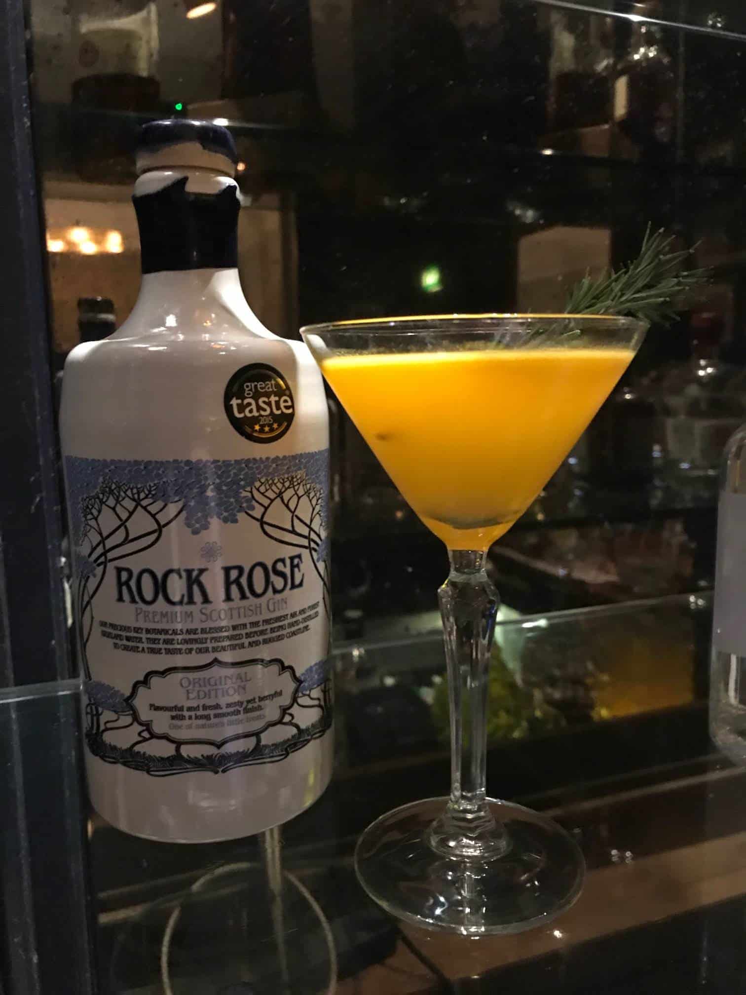 Bottle of Rock Rose Gin and Gin and Jam cocktail served in a cocktail glass