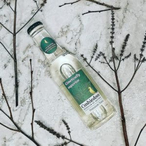 Glass bottle of Cushiedoos premium tonic