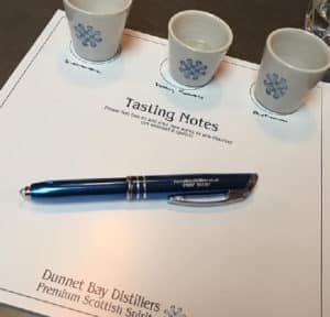 Picture of a printed "Tasting notes" sheet and 3 tumbles
