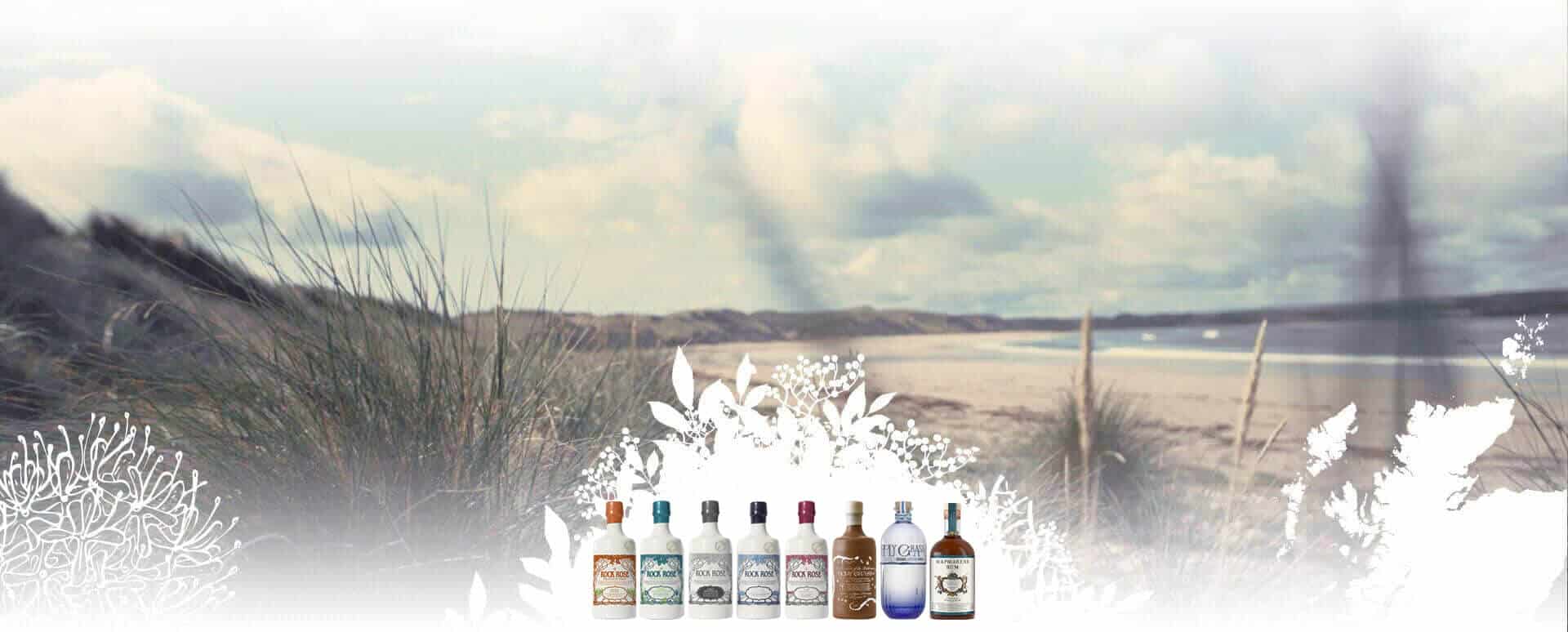 Dunnet Bay Distillers spirits bottles lined-up with Dunnet Bay beach in the background