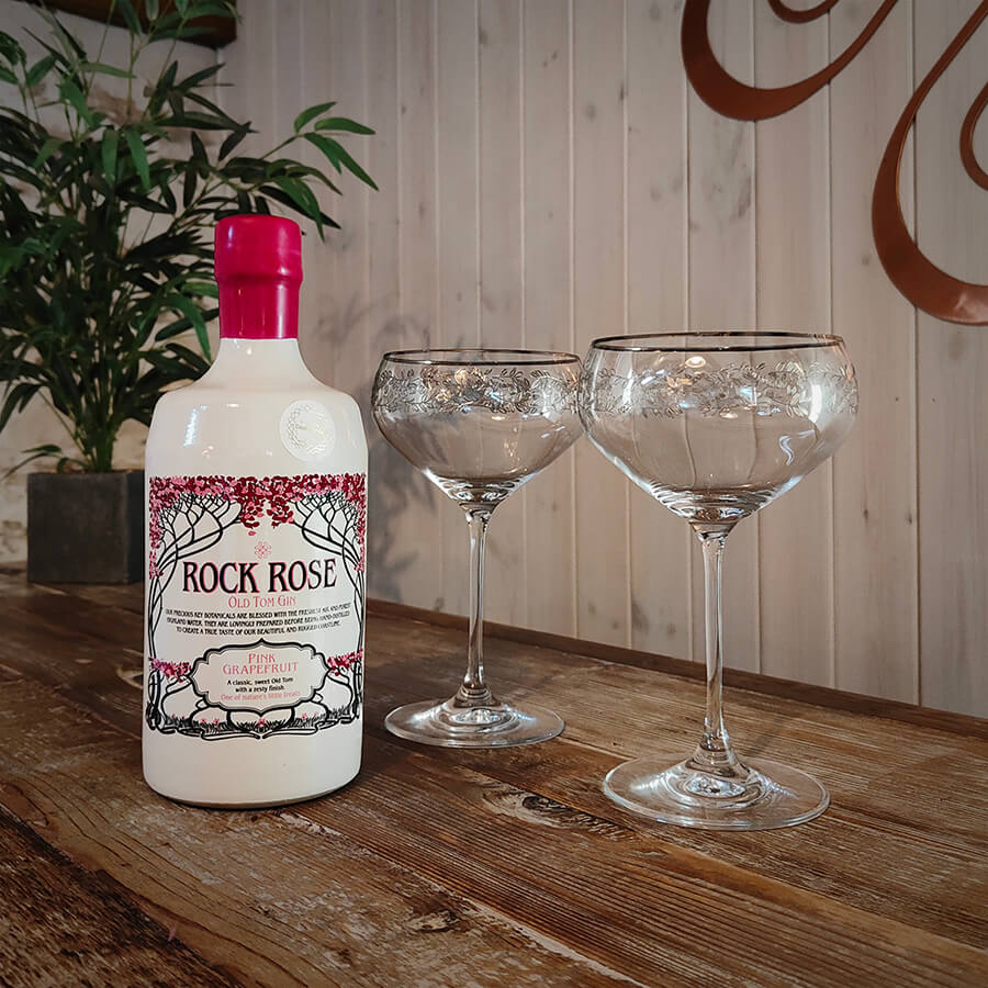 Our Valentine bundle with a 70cl bottle of Rock Rose Old Tom Gin and 2 branded Rock Rose Gin coupe glasses